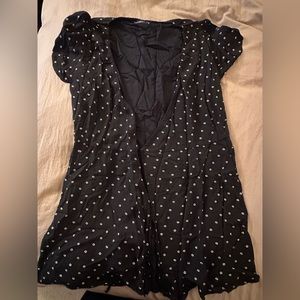 Black dress wrap tie dress with white polka dots